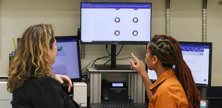 two women reviewing data